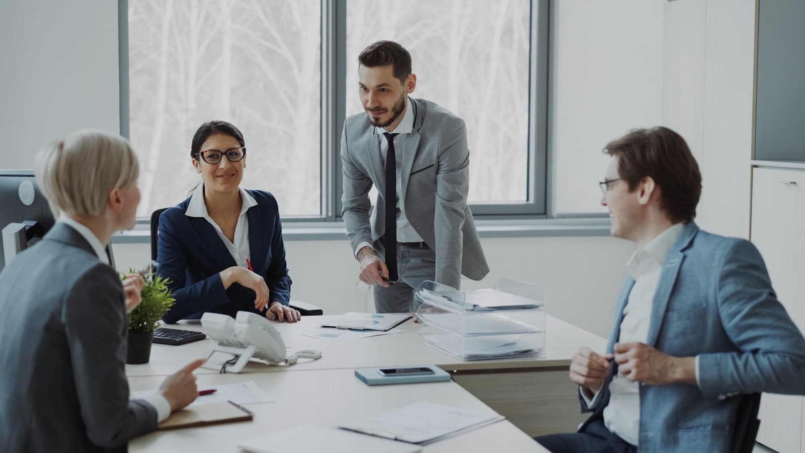 Advisors collaborating around a conference table